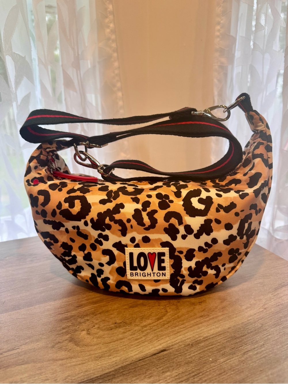 BRIGHTON Spotted Love Swing Bag Leopard Print , approx. 13” x7”, removable strap